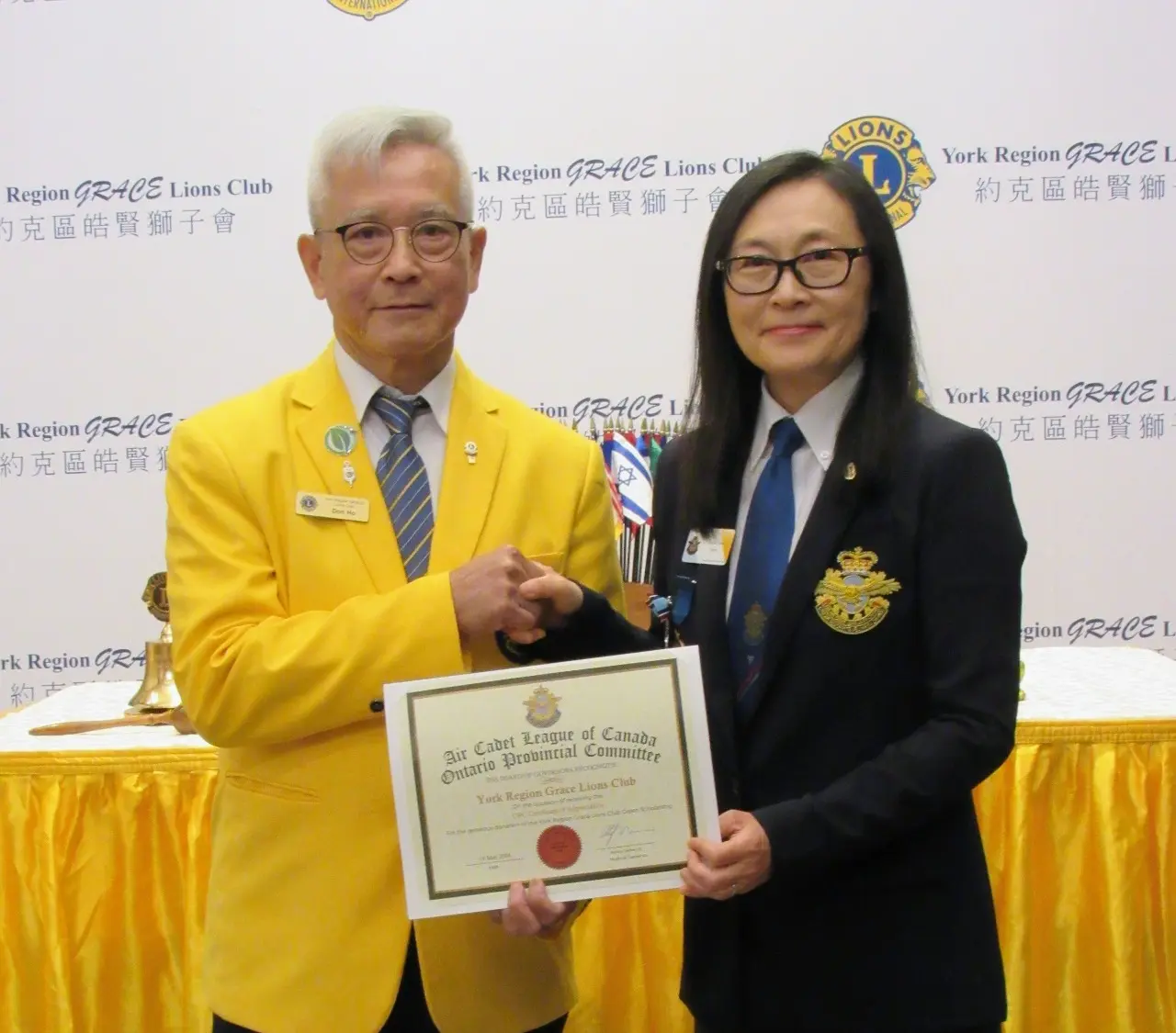 York-Region-GRACE-Lions-Club-president-Don-Ho-received-appreciation-plaque-from-Ontario-youth-air-cache-Marie-Shea