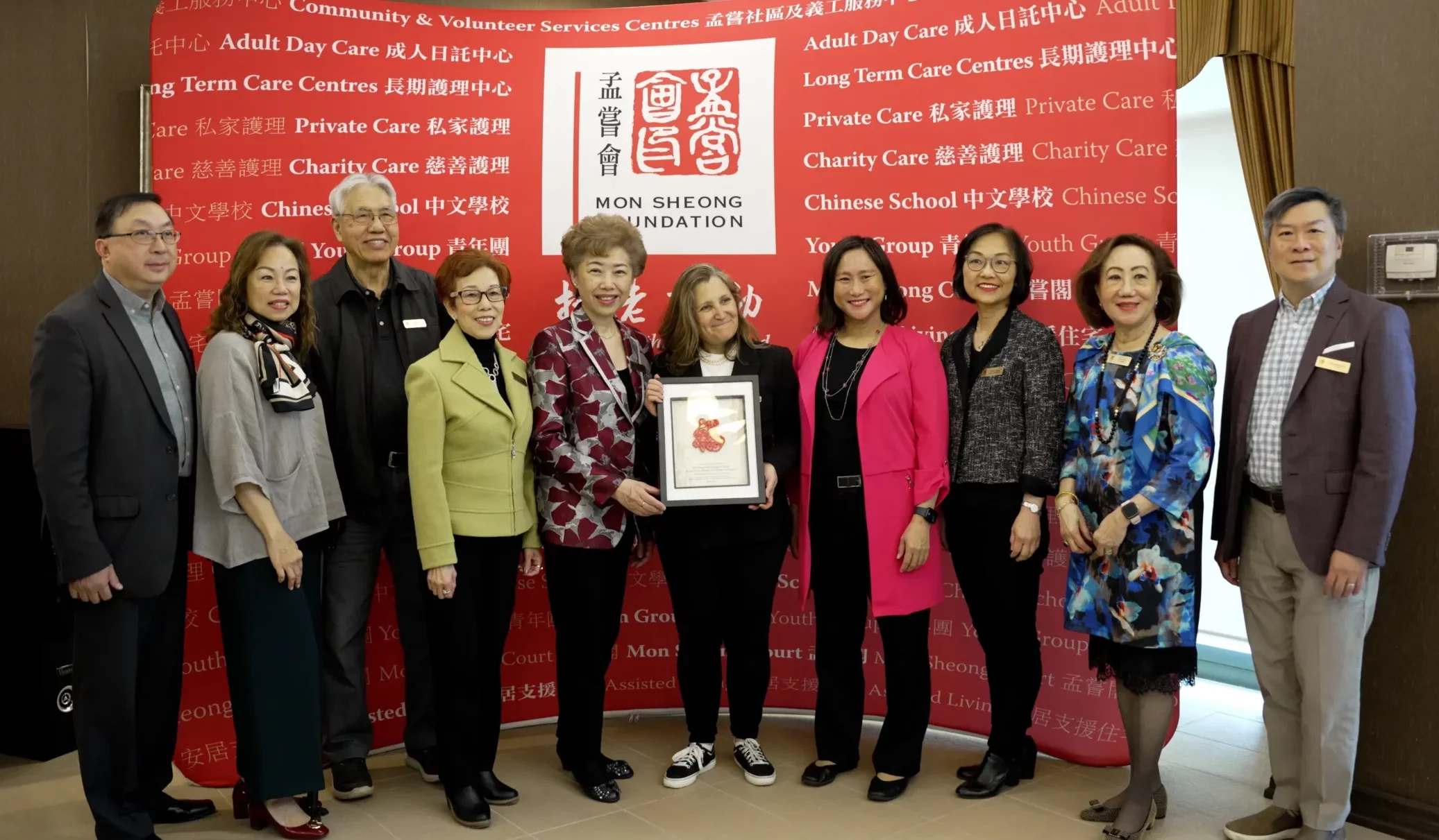 Mon Sheong representatives took picture with Freeland